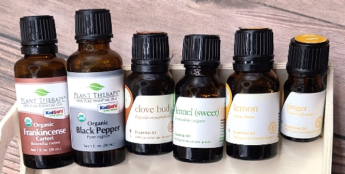Bottles of essential oil for Motivation aromatherapy inhaler